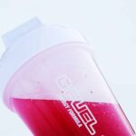 g fuel shaker bottle with red liquid in it