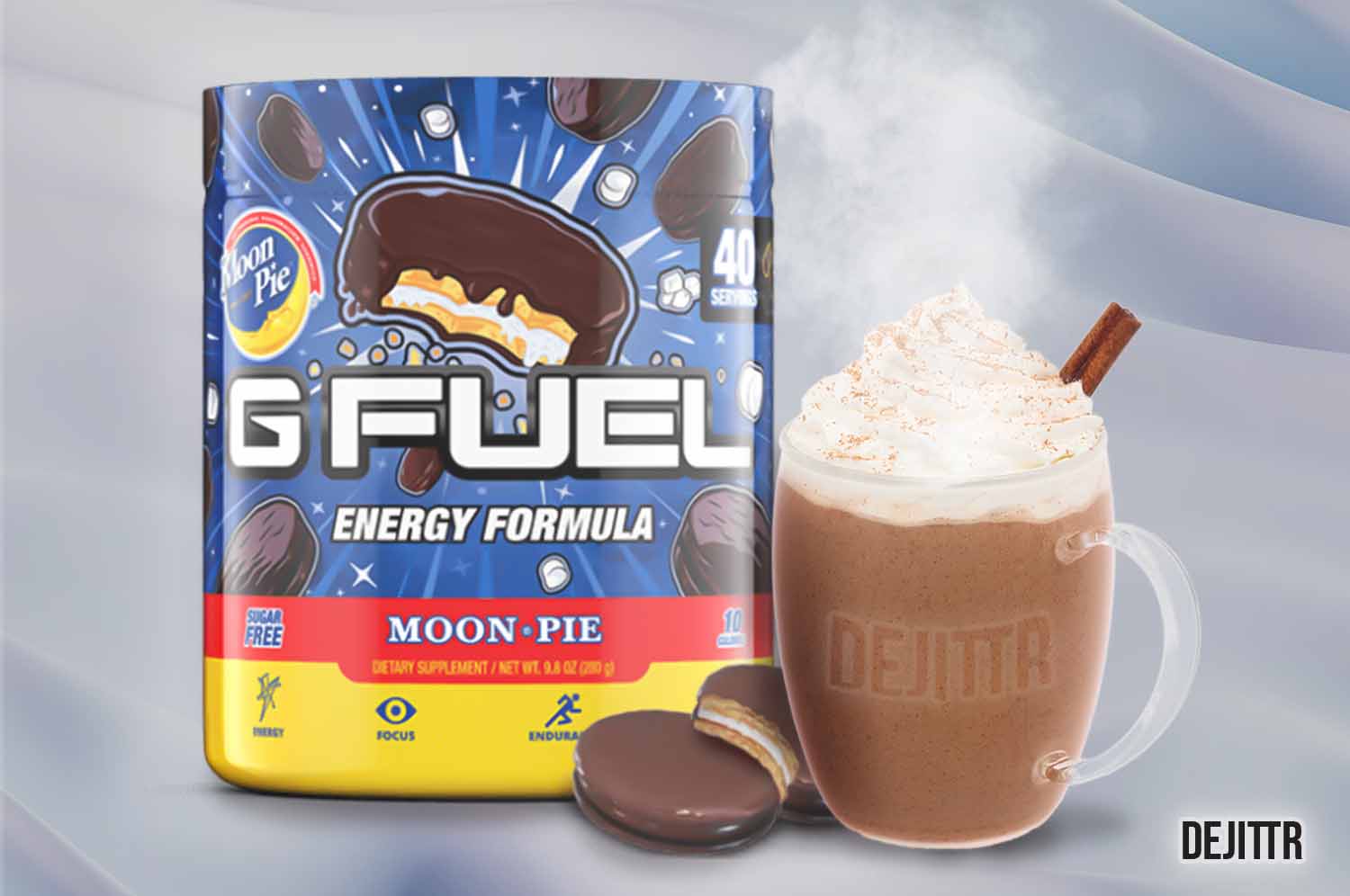 Tub of G FUEL moon pie flavor with a glass mug filled with hot brown beverage with whip cream on top with cinnamon stick